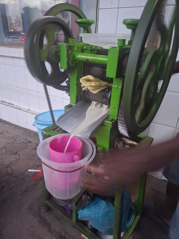 local machine making sugar cane juice