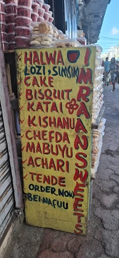 swahili snack names written on a handpainted sign