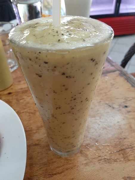 a glass of passion fruit juice
